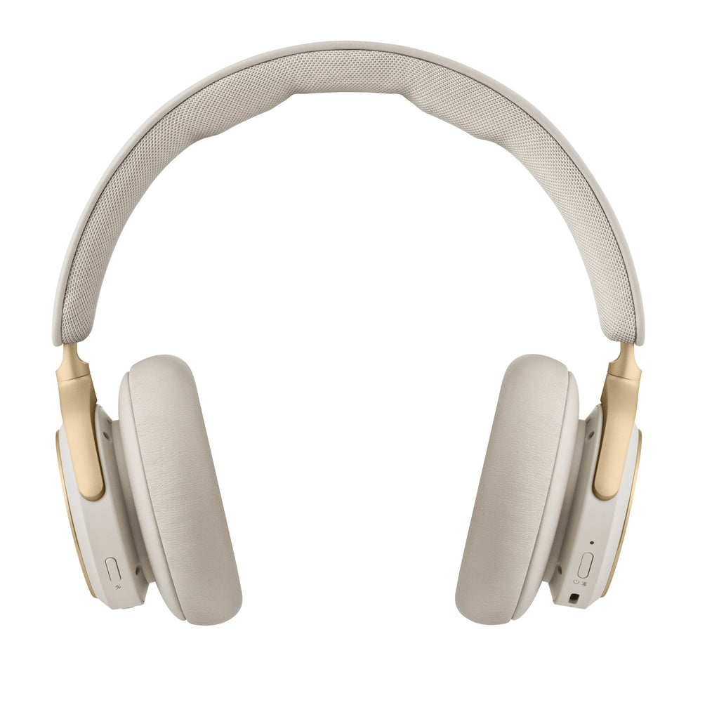 Rückansicht der Beoplay HX Kopfhörer. Diese Perspektive zeigt die physischen Bedienelemente, darunter den Schieberegler für das Pairing und die USB-C Ladebuchse.