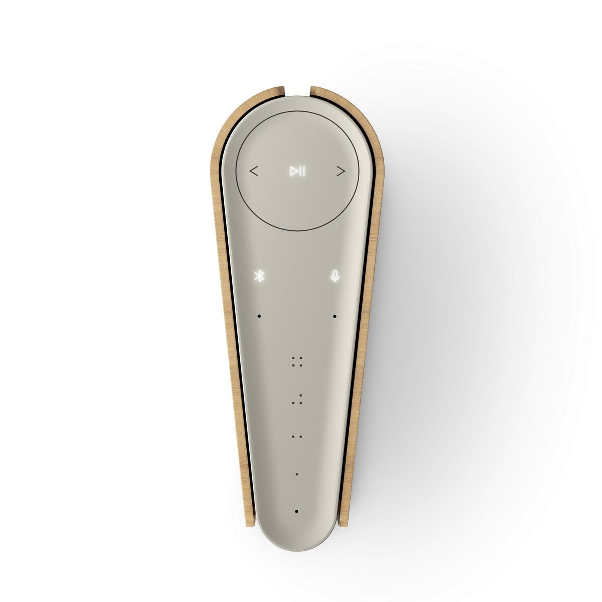 Top-down Ansicht des Beosound Emerge; verdeutlicht die keilförmige 'Buchrücken'-Form und das minimalistische Bedienfeld mit Mikrofon- und Bluetooth-Indikatoren.